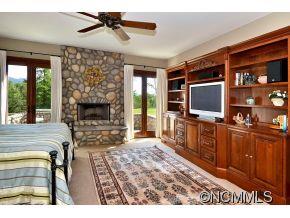 1380 Pkwy N Road Mill Spring, NC 28756 - Photo 9 of 24 a living room with furniture and a flat screen tv