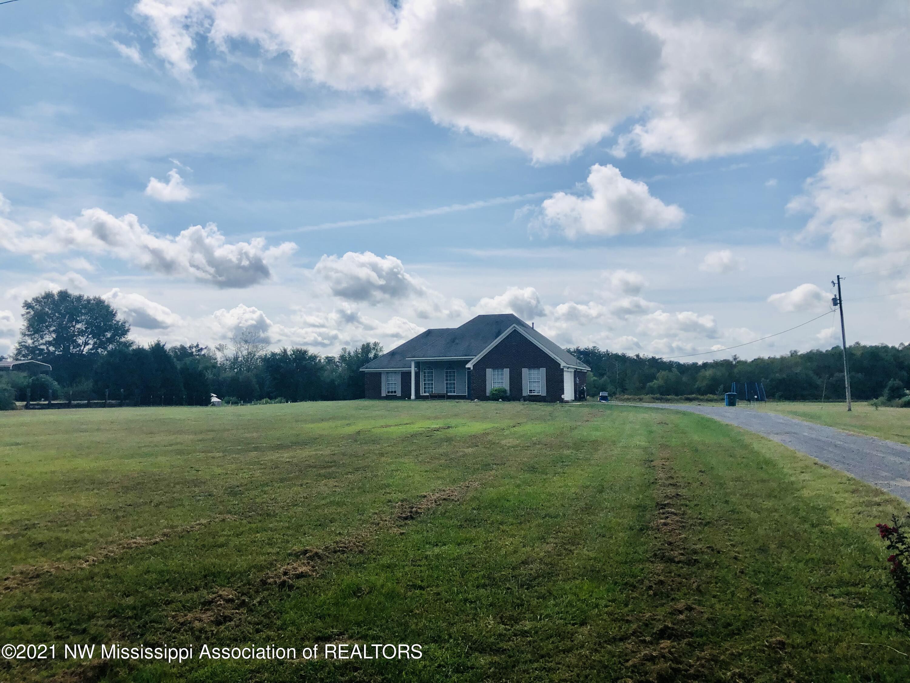 7575 Grass Pond Road Hernando, MS 38632 - Photo 1 of 11 2A86F304-5FCE-4158-BF43-AA84FD174CA9