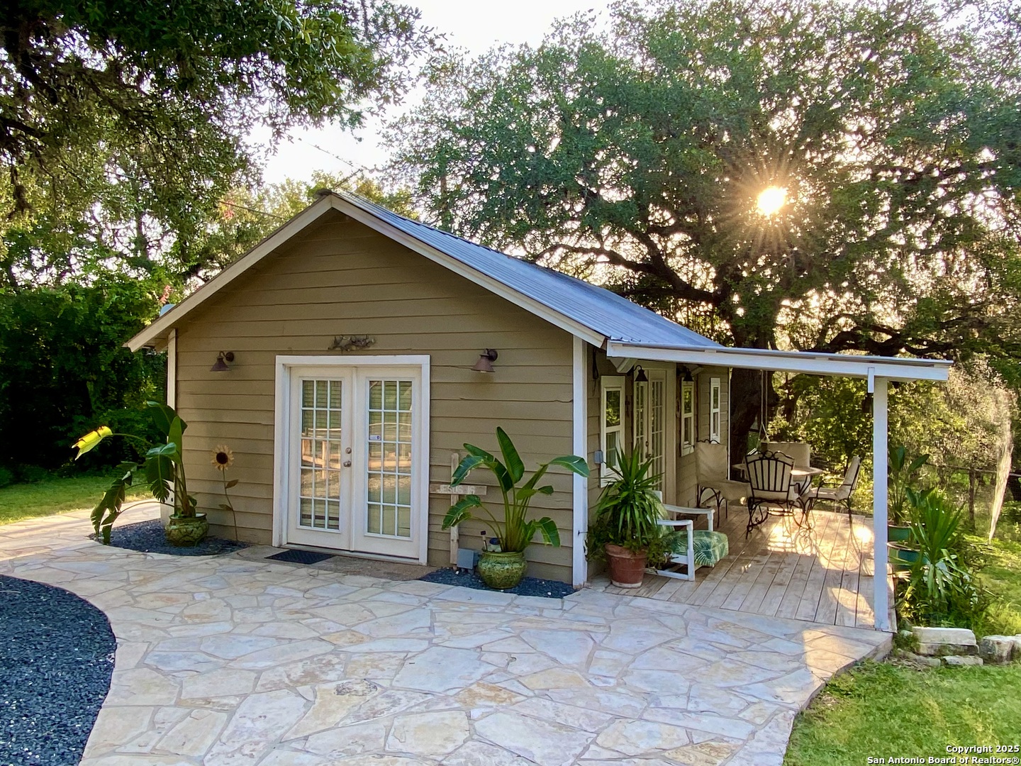 512 County Road 348 Concan, TX 78838 - Photo 27 of 39 a view of a house with patio