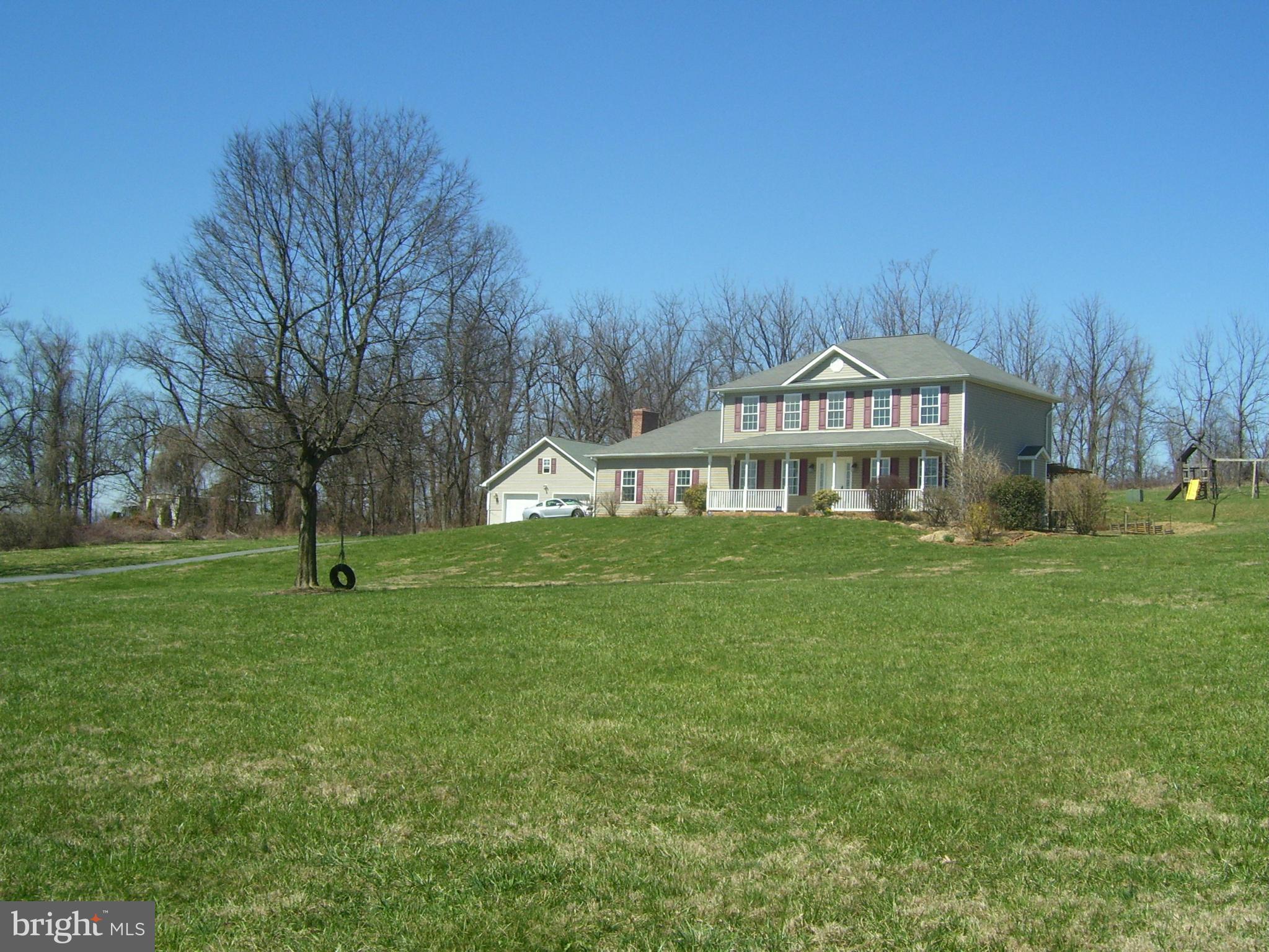 3311 Apple Pie Ridge Road Winchester, VA 22603 - Photo 2 of 23 a front view of a house with a yard