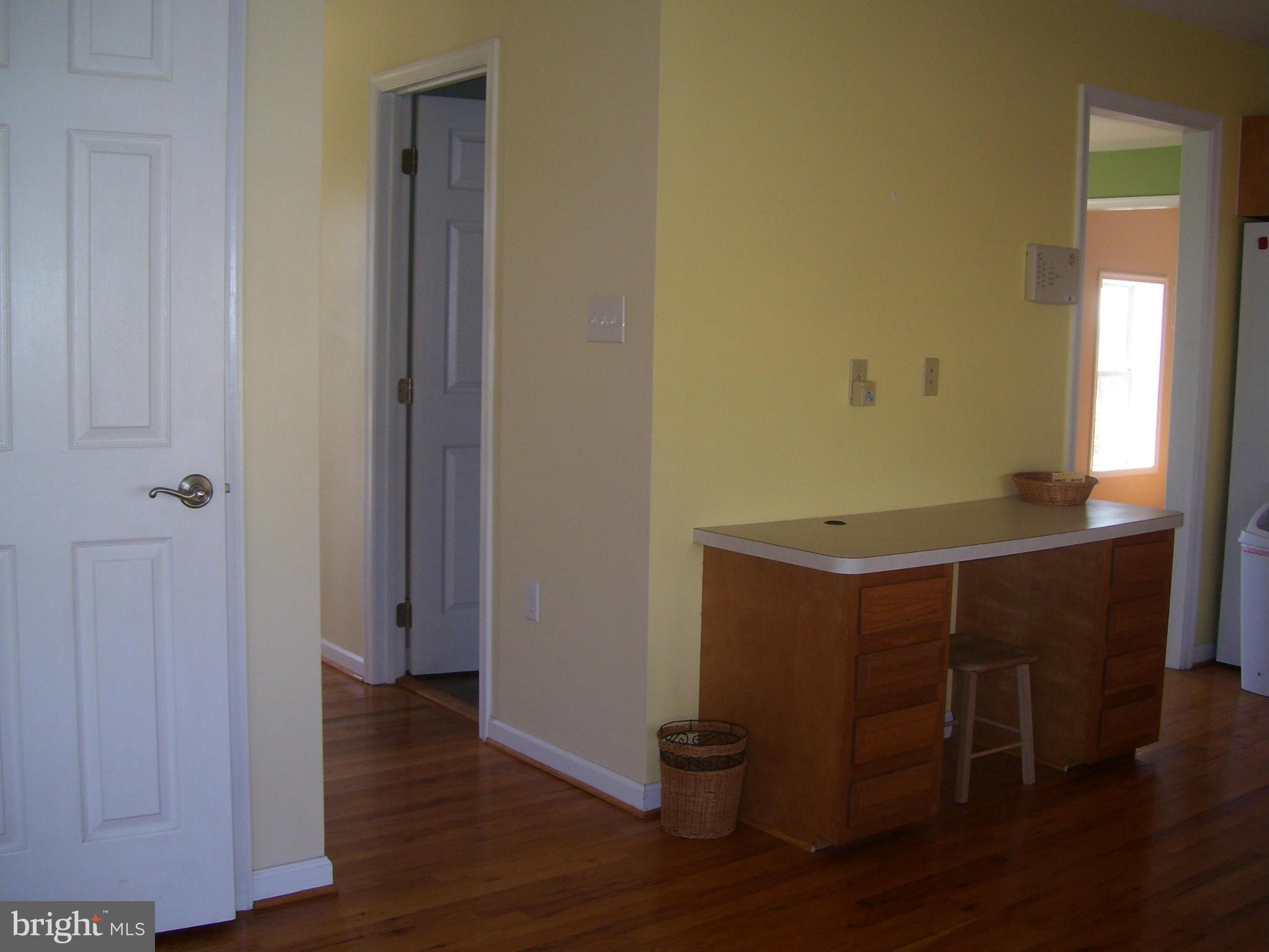 3311 Apple Pie Ridge Road Winchester, VA 22603 - Photo 13 of 23 a room with wooden floor and furniture