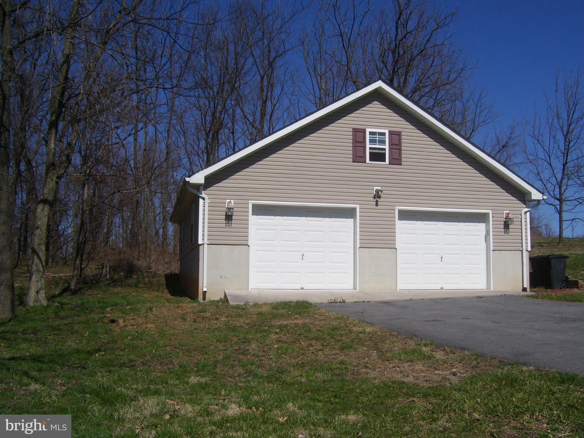 3311 Apple Pie Ridge Road Winchester, VA 22603 - Photo 5 of 23 a view of house with backyard and bushes
