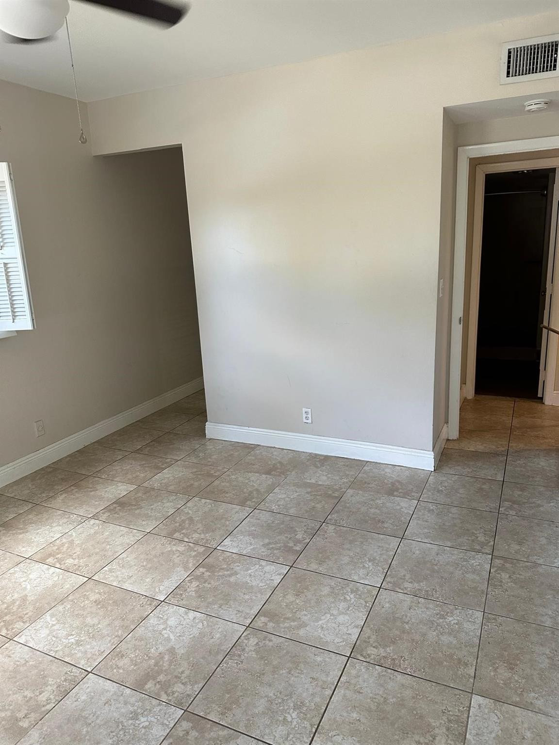 400 North Riverside Drive, Unit 102 Pompano Beach, FL 33062 - Photo 9 of 20 a view of an empty room and window