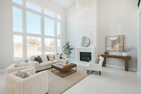 a balcony with furniture and a fireplace