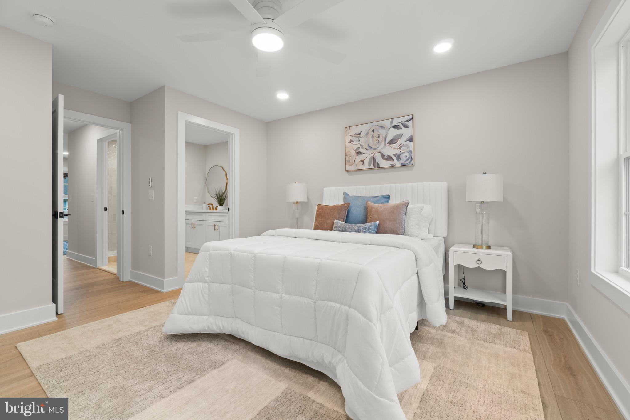 1505 Chestnut Avenue Haddon Heights, NJ 08035 - Photo 21 of 38 a bedroom with a large bed and a chandelier