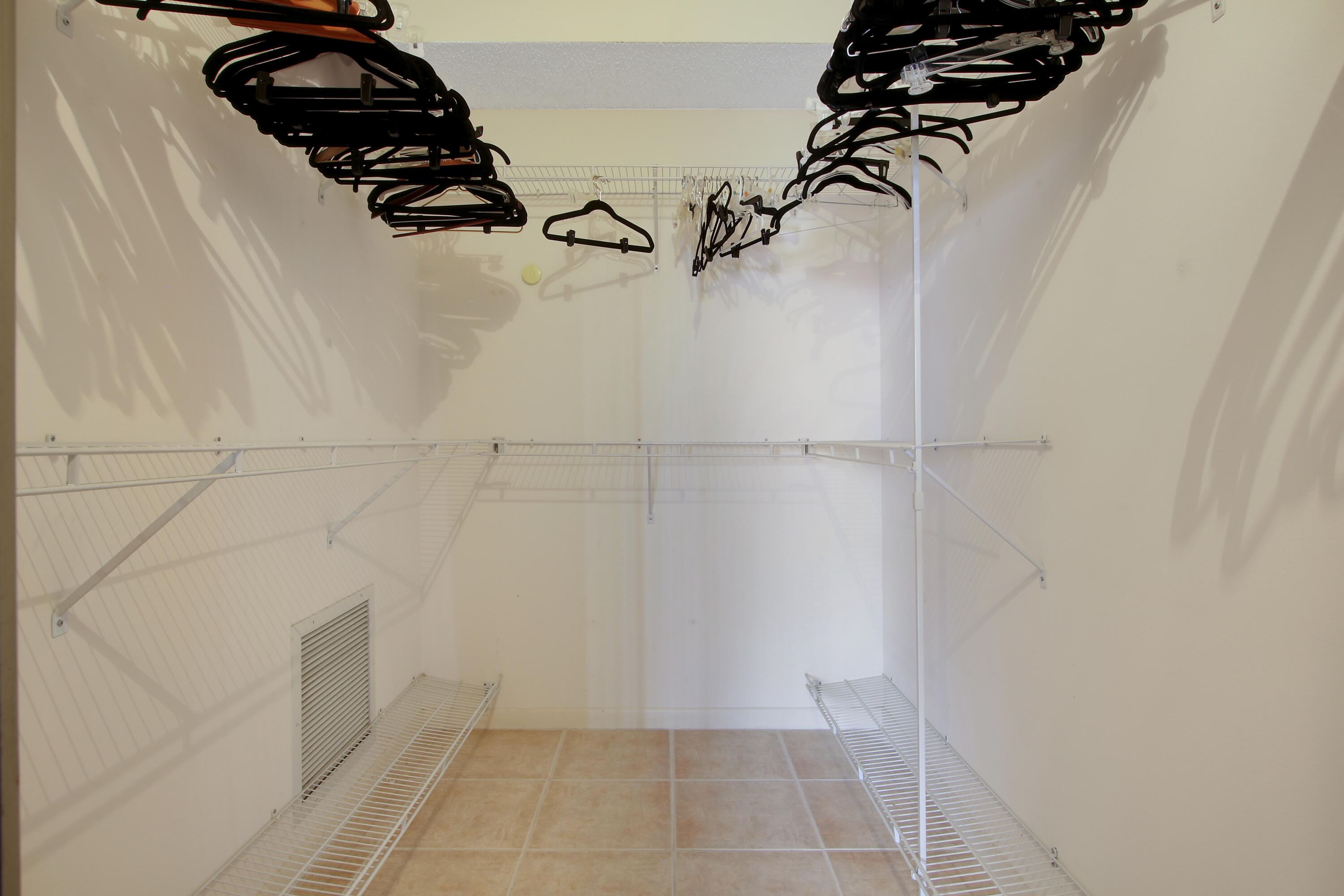 104 Half Moon Circle, Unit G3 Hypoluxo, FL 33462 - Photo 12 of 30 Walk in Closet