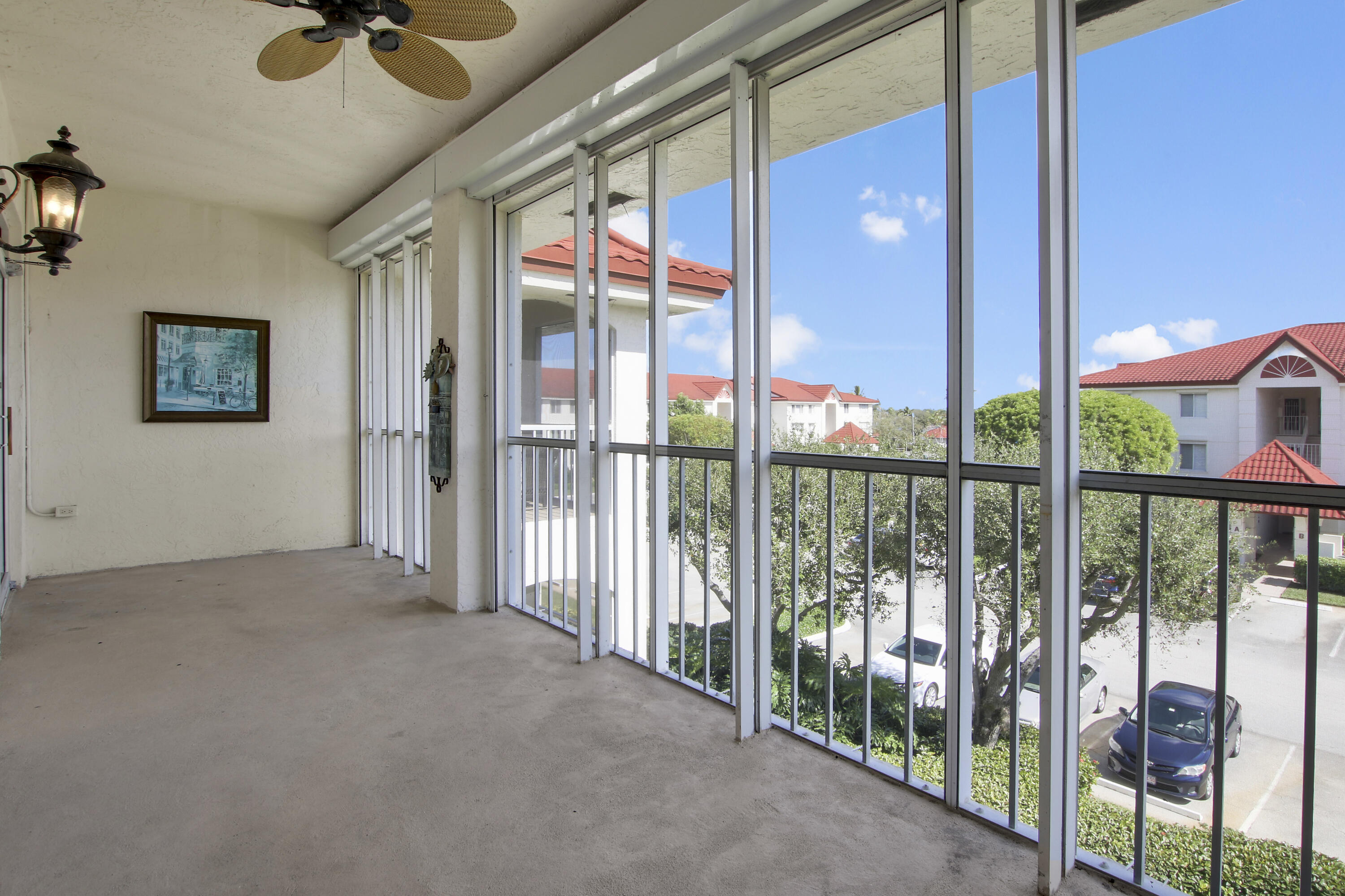 104 Half Moon Circle, Unit G3 Hypoluxo, FL 33462 - Photo 8 of 30 Screened Balcony