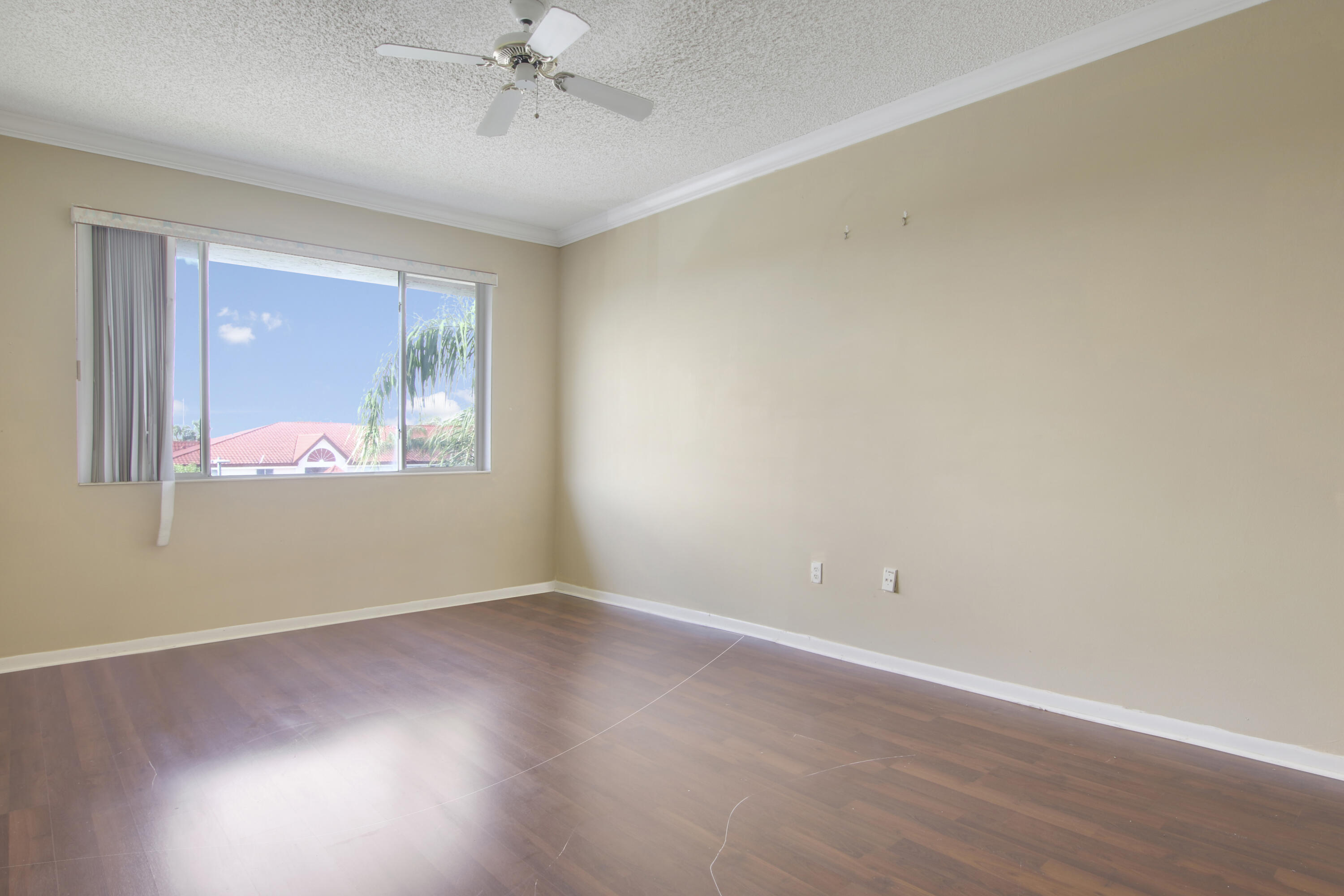 104 Half Moon Circle, Unit G3 Hypoluxo, FL 33462 - Photo 9 of 30 Master Bedroom