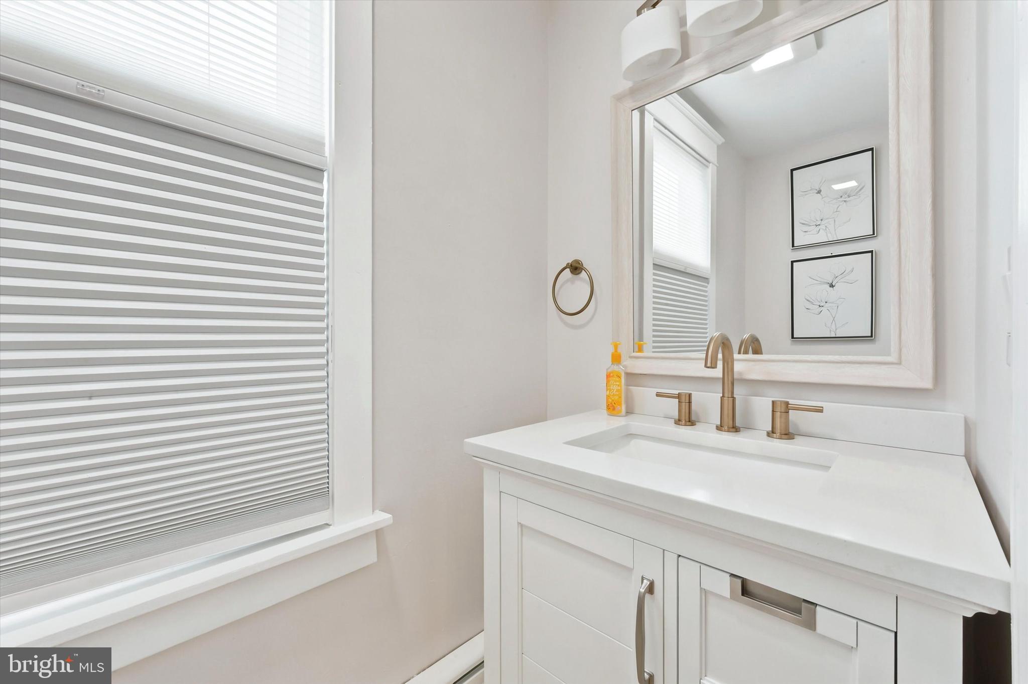 204 Harding Avenue Havertown, PA 19083 - Photo 10 of 23 Powder room off of the kitchen