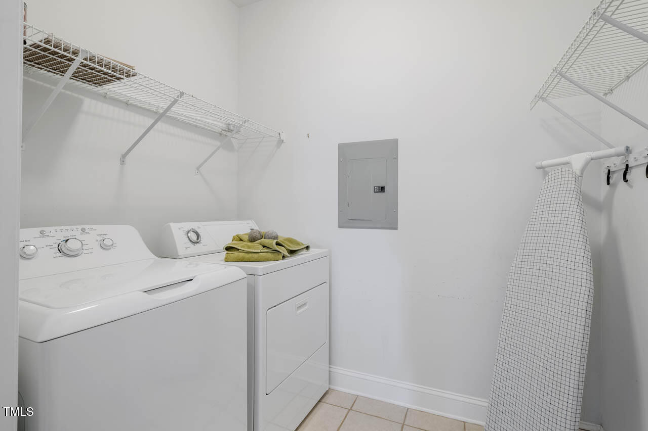1221 Arborgate Circle, Unit 12 Chapel Hill, NC 27514 - Photo 16 of 20 a utility room with dryer and washer