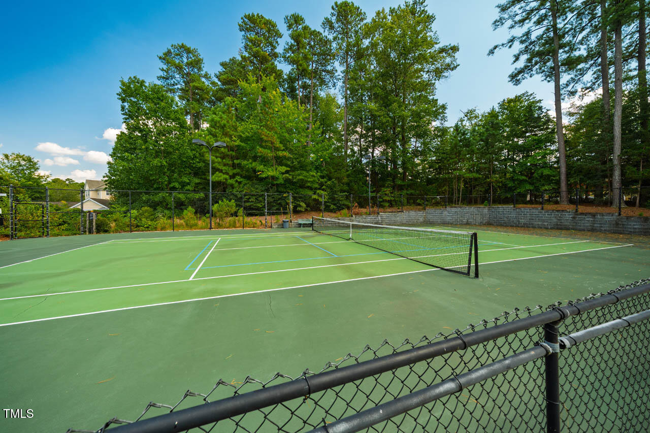 1221 Arborgate Circle, Unit 12 Chapel Hill, NC 27514 - Photo 19 of 20 a view of a tennis court