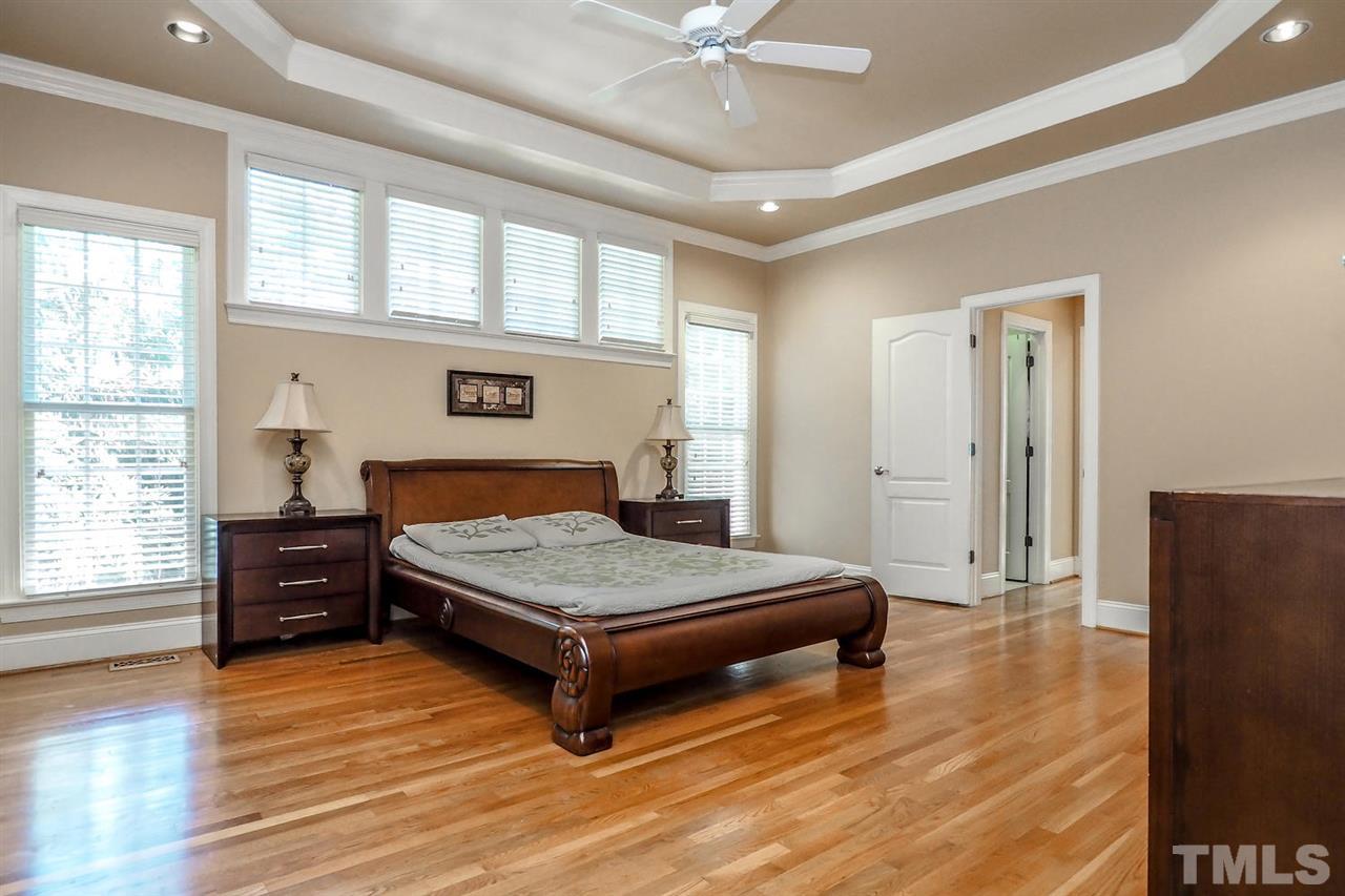 7017 Potomac Court Raleigh, NC 27613 - Photo 12 of 25 a bedroom with a bed and window