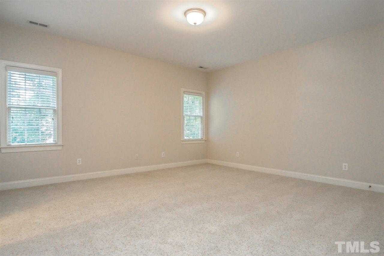 7017 Potomac Court Raleigh, NC 27613 - Photo 16 of 25 an empty room with a window