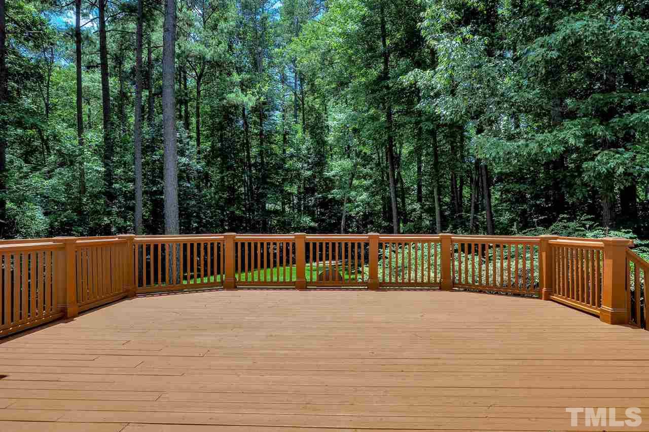 7017 Potomac Court Raleigh, NC 27613 - Photo 20 of 25 a view of deck and a yard