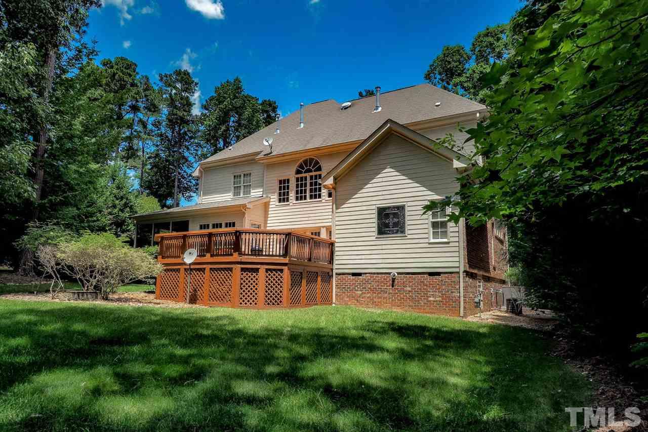 7017 Potomac Court Raleigh, NC 27613 - Photo 21 of 25 a view of a house with backyard