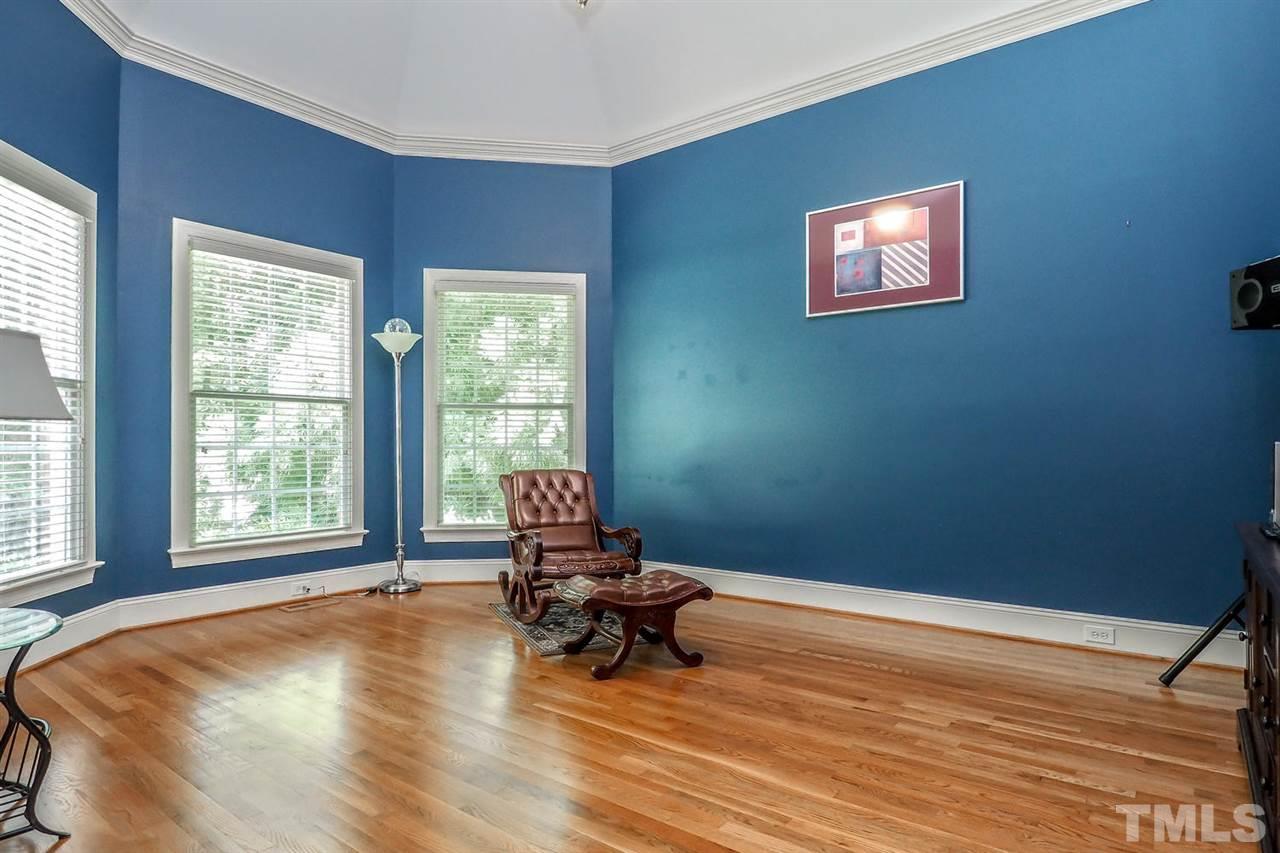 7017 Potomac Court Raleigh, NC 27613 - Photo 4 of 25 a living room with furniture and a window