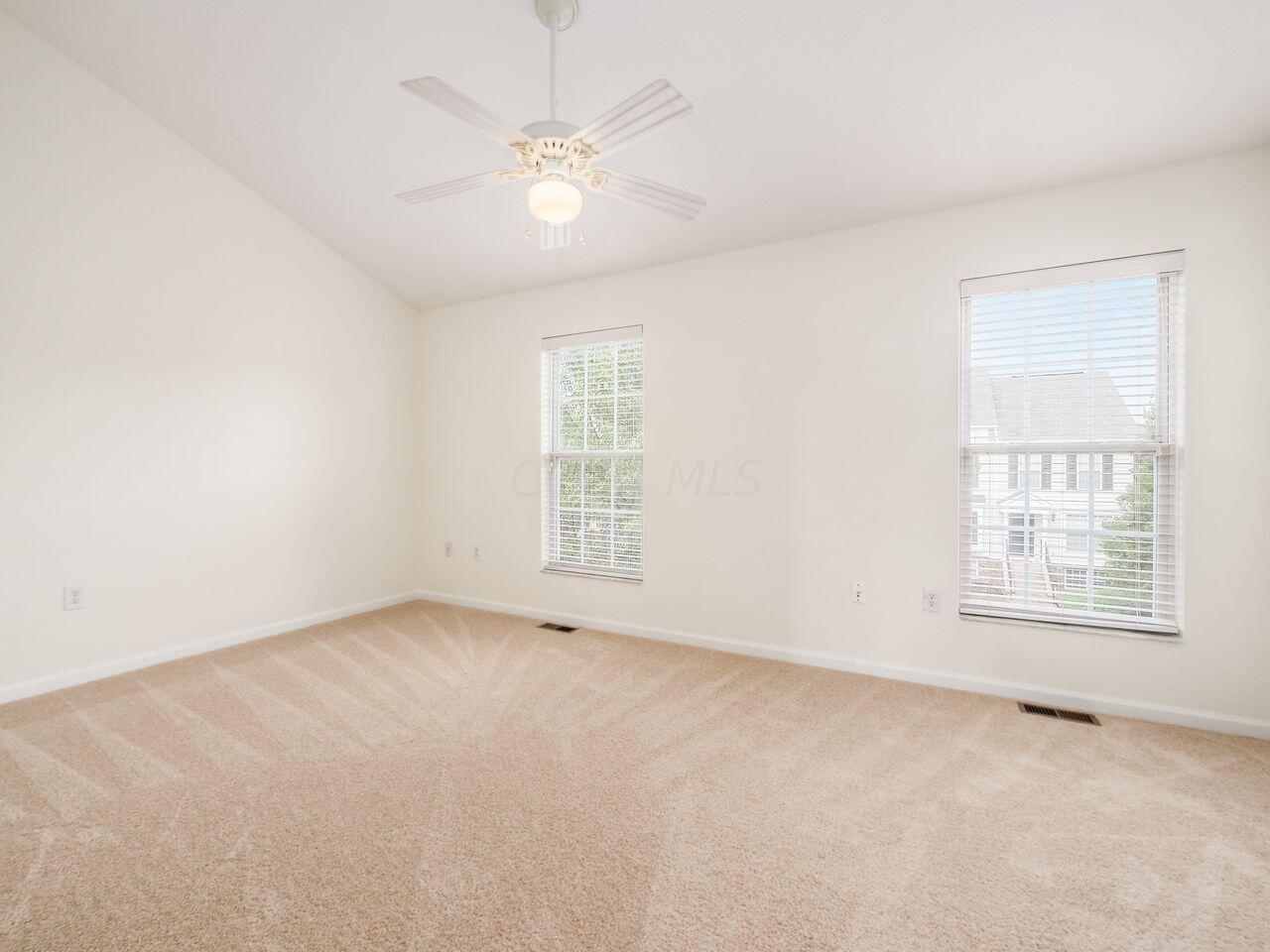 6305 Needletail Road, Unit 25 Columbus, OH 43230 - Photo 23 of 49 The second bedroom also features new carpet and vaulted ceilings.