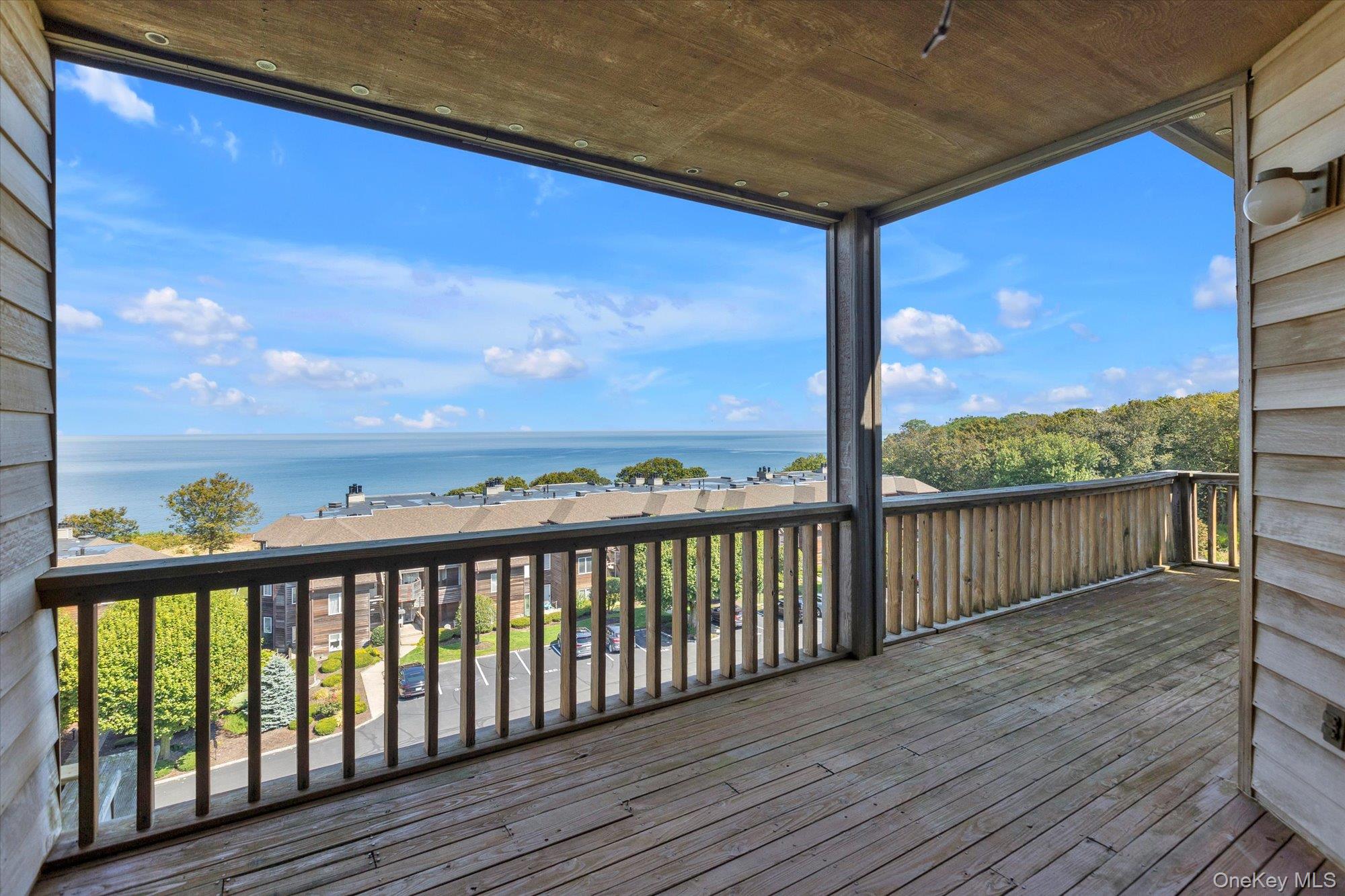 209 Fox Hill Drive Baiting Hollow, NY 11933 - Photo 17 of 28 Deck featuring a water view