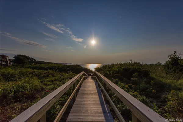a view of balcony and yard
