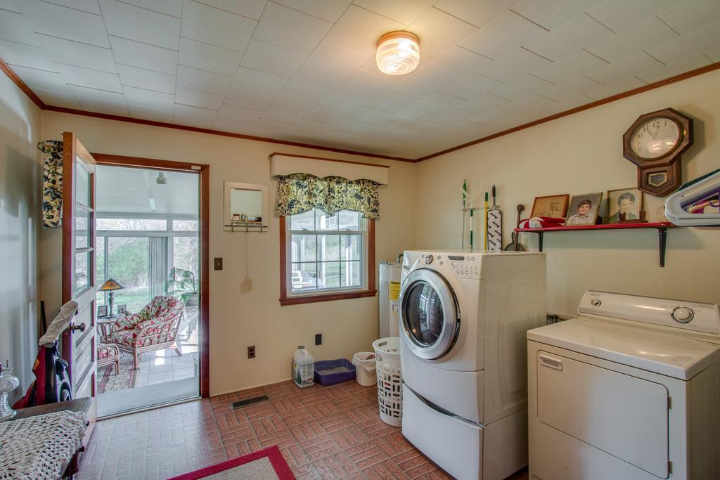 1585 Taylorsville Road Lebanon, TN 37087 - Photo 20 of 28 12x12 Utility Room ideal for hobby room or and additional bath