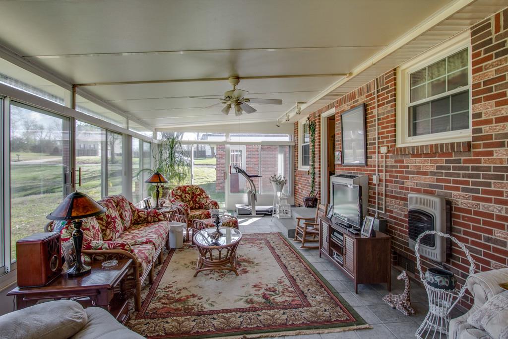 1585 Taylorsville Road Lebanon, TN 37087 - Photo 22 of 28 Florida Room overlooks the gentle flowing creek and opens to screened porch