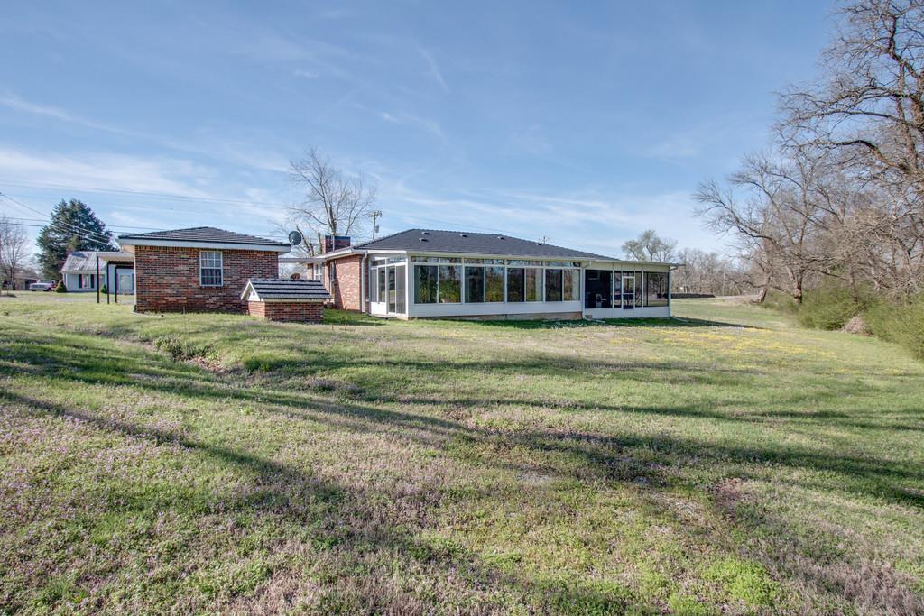 1585 Taylorsville Road Lebanon, TN 37087 - Photo 25 of 28 In addition to City Water the property has its own well system(the small brick structure in back of garage)
