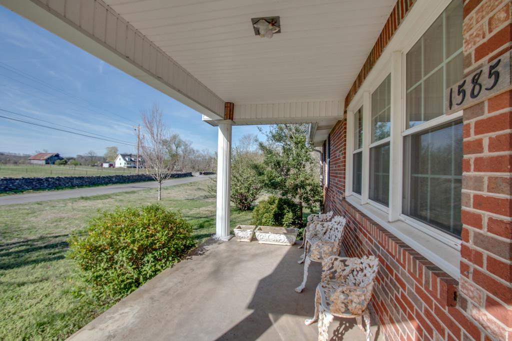 1585 Taylorsville Road Lebanon, TN 37087 - Photo 4 of 28 Rocking chair front porch