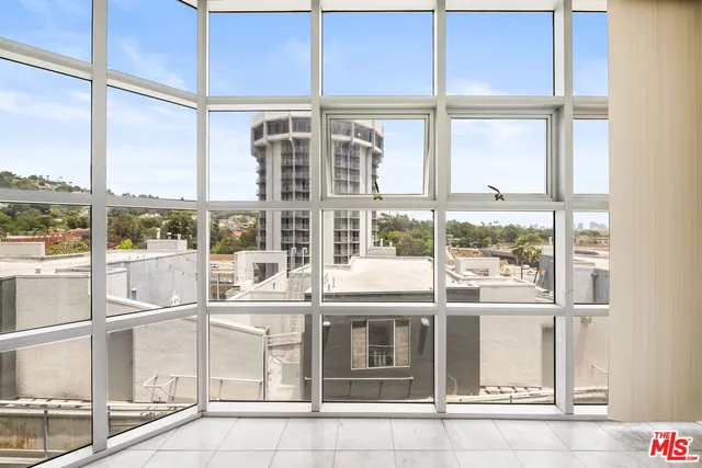 a large window with a glass door
