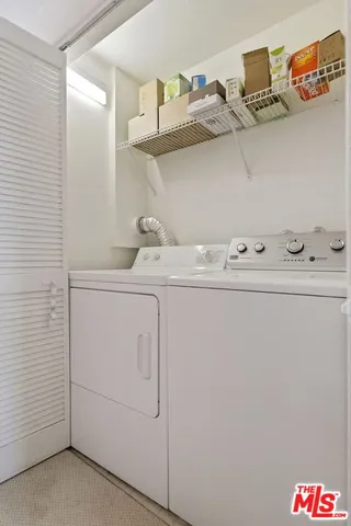 a view of a balcony door and furniture