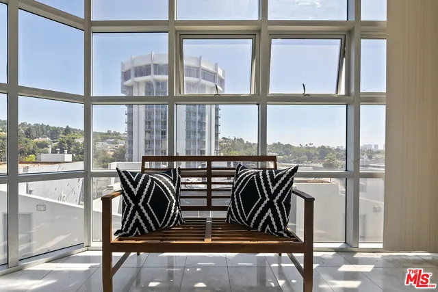 a view of a building and trees around
