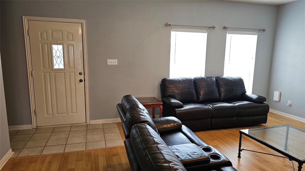 611 Gladness Rhome, TX 76078 - Photo 14 of 40 a living room with furniture and a window