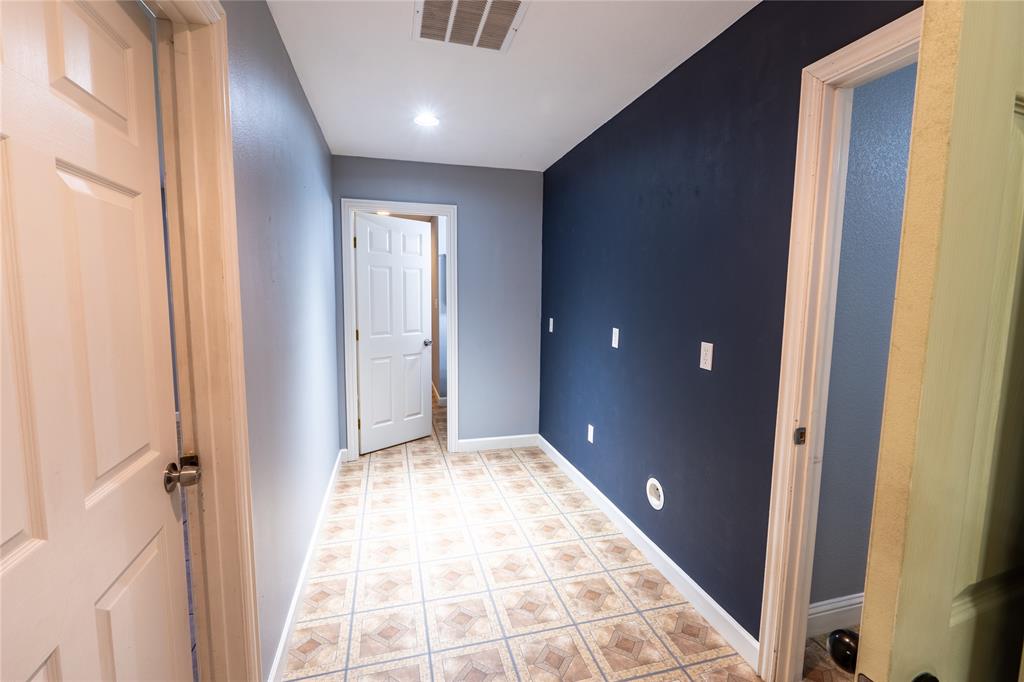 611 Gladness Rhome, TX 76078 - Photo 36 of 40 a view of hallway with window and hardwood floor