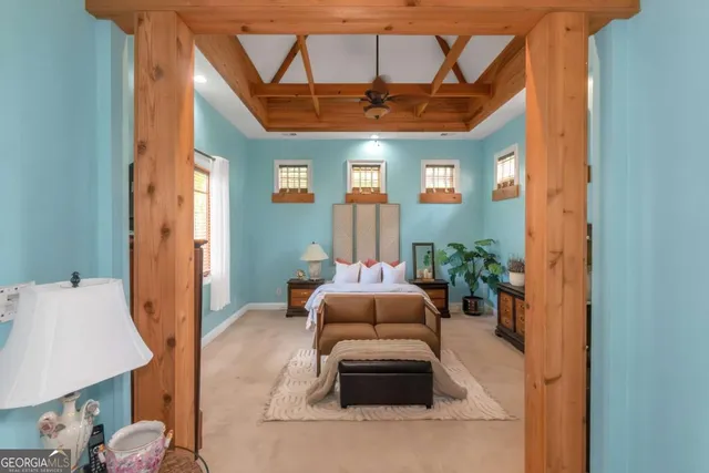 a living room with furniture and a window