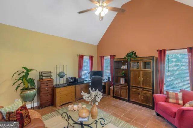 a kitchen with stainless steel appliances granite countertop a refrigerator and a counter space