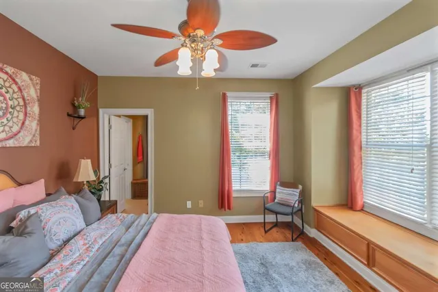 an aerial view of a house with outdoor space and a lake view