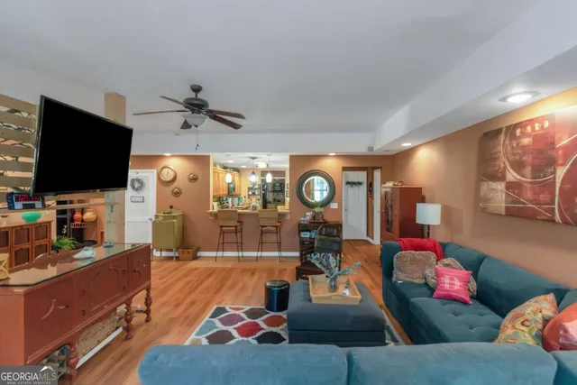 a picture of a room with a white wall and a window