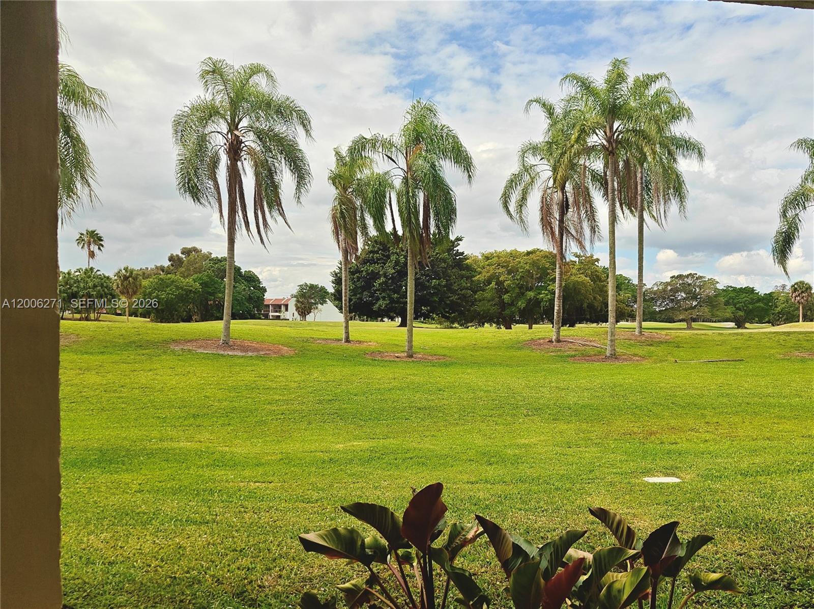 16300 Golf Club Road, Unit 204 Weston, FL 33326 - Photo 12 of 16 a view of an outdoor space with swimming pool