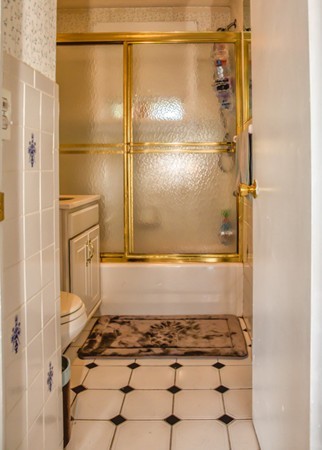 22 Fayette Street Springfield, MA 01118 - Photo 16 of 25 a bathroom with a window