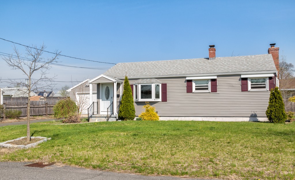 22 Fayette Street Springfield, MA 01118 - Photo 3 of 25 a front view of house with yard and green space