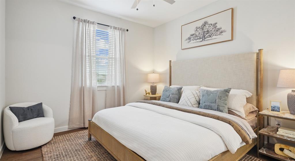 9013 Peridot Way Fort Worth, TX 76123 - Photo 3 of 27 a bedroom with bed and a couch