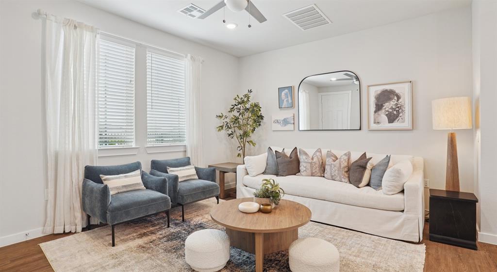 9013 Peridot Way Fort Worth, TX 76123 - Photo 6 of 27 a living room with furniture and a large window