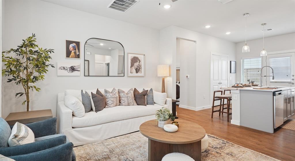 9013 Peridot Way Fort Worth, TX 76123 - Photo 8 of 27 a living room with furniture and wooden floor