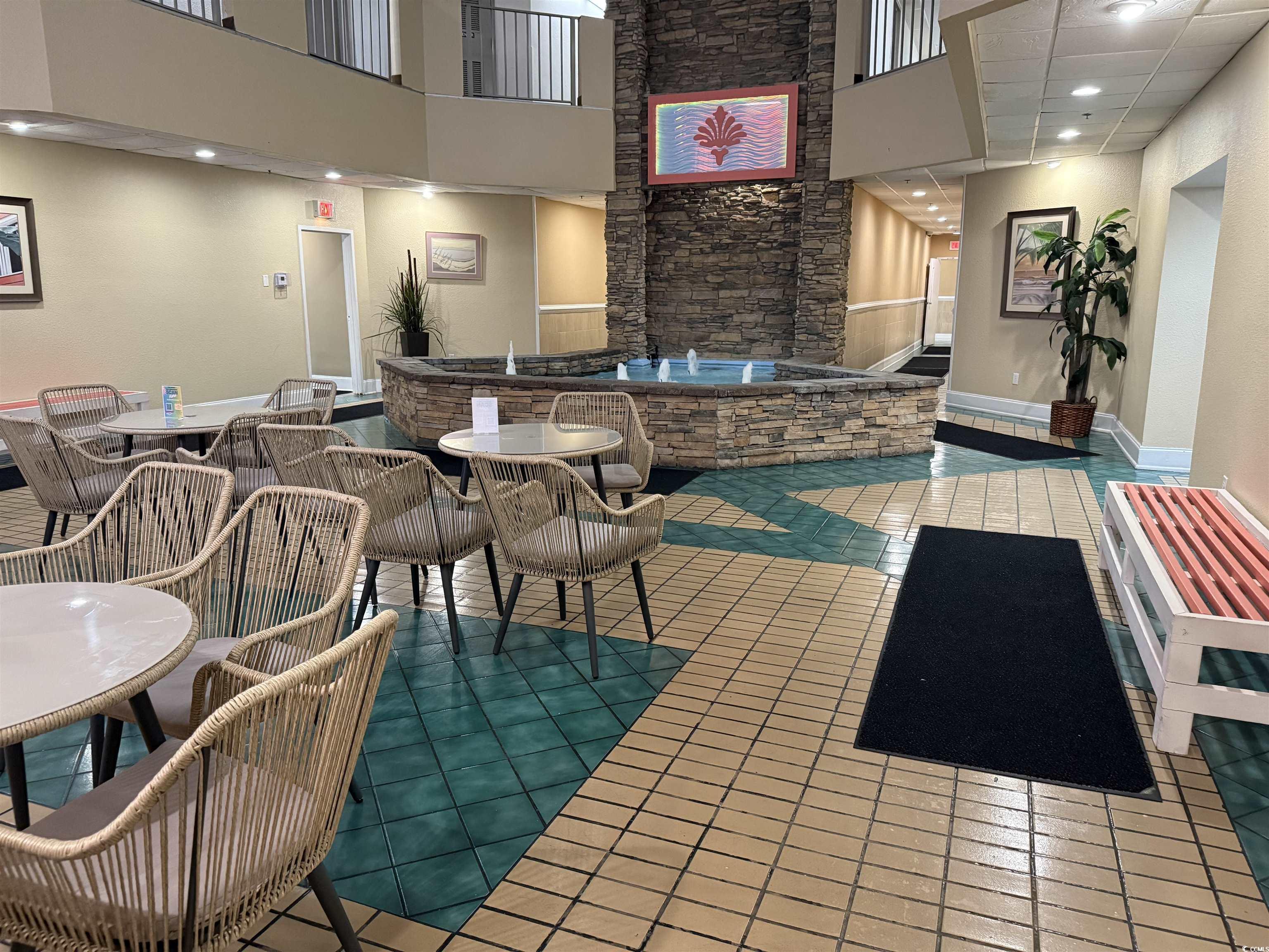 1605 South Ocean Boulevard, Unit 1211 Myrtle Beach, SC 29577 - Photo 22 of 22 Bedroom with a closet and wood finished floors