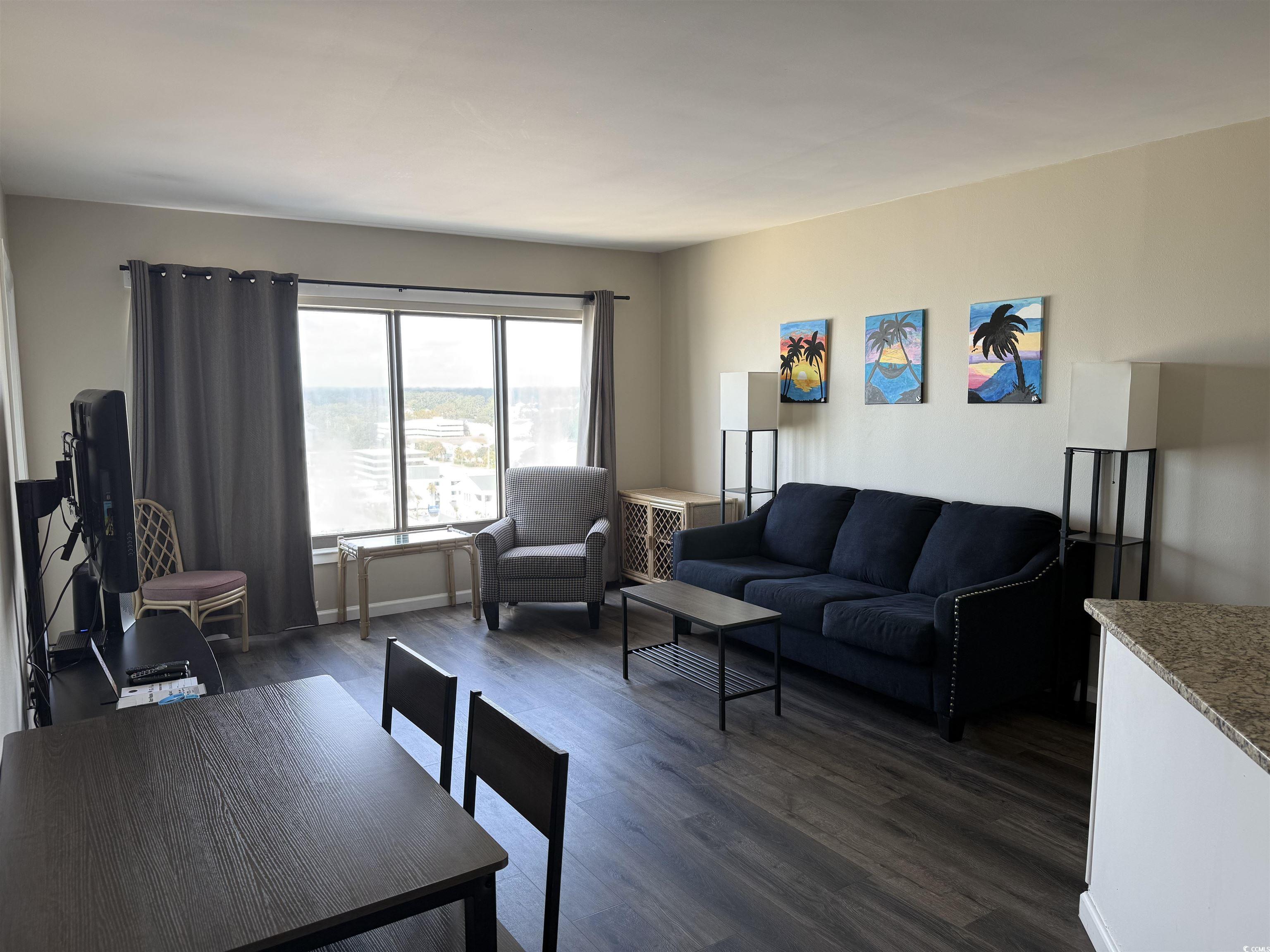 1605 South Ocean Boulevard, Unit 1211 Myrtle Beach, SC 29577 - Photo 9 of 22 Living room with dark wood-style flooring