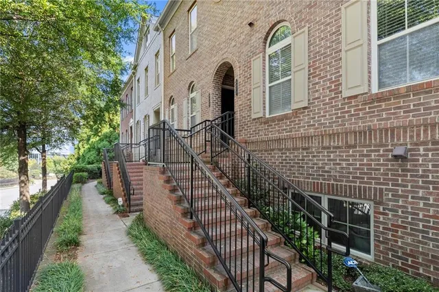 a view of a brick wall of the building