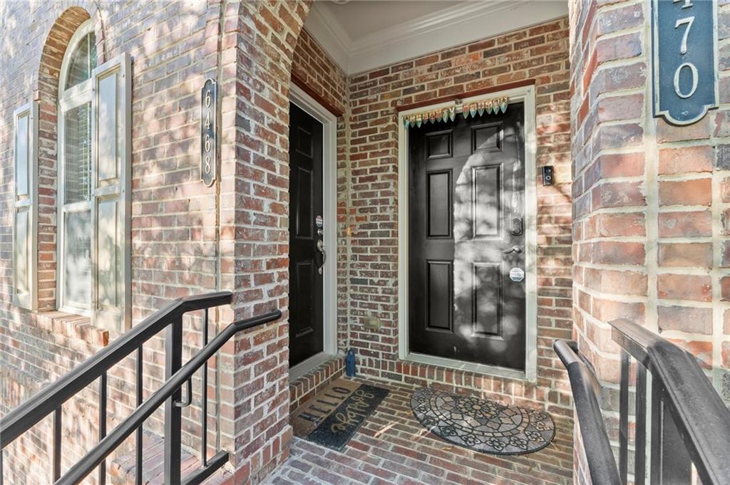6468 Chariot Street, Unit 19 Atlanta, GA 30328 - Photo 2 of 43 a view of a brick wall with a window