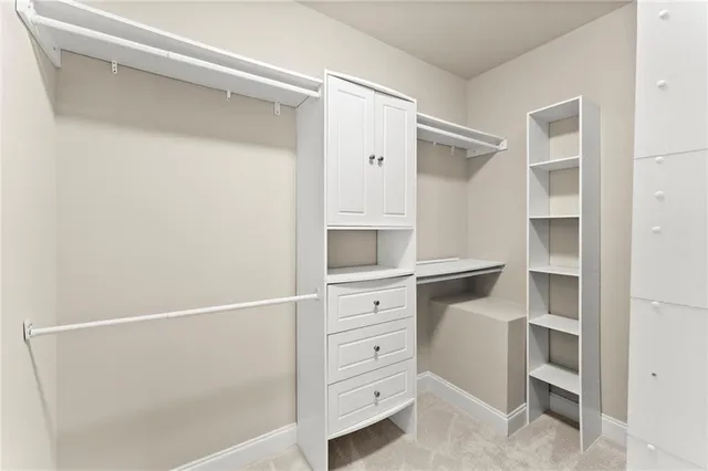 a view of an empty walk in closet