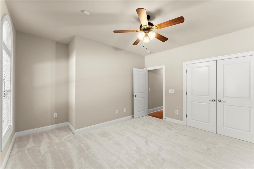 6468 Chariot Street, Unit 19 Atlanta, GA 30328 - Photo 24 of 43 a view of an empty room