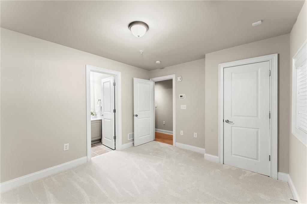 6468 Chariot Street, Unit 19 Atlanta, GA 30328 - Photo 28 of 43 a view of an empty room