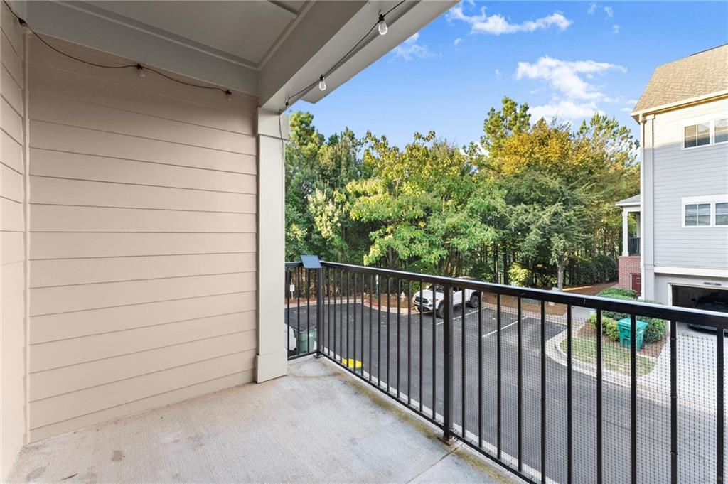 6468 Chariot Street, Unit 19 Atlanta, GA 30328 - Photo 30 of 43 a view of a balcony